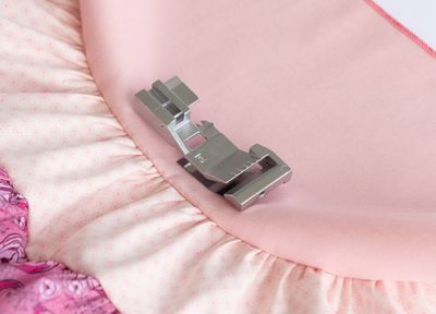 (5F13) Baby Lock Rynkefot 2-i-1 Gr.10